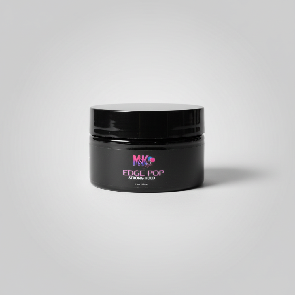 Black jar of hair product with a pink background