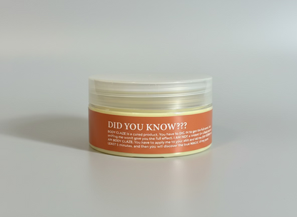 Jar with an orange label on a dark surface