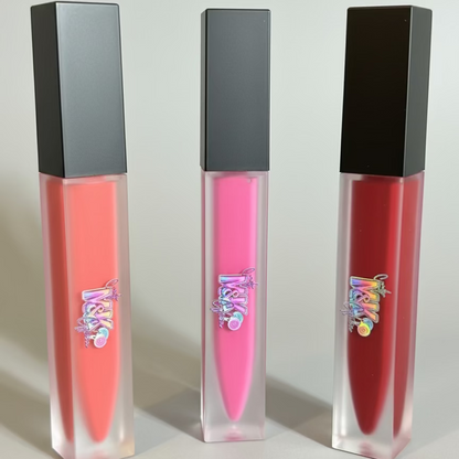 Three lip glosses with black caps 